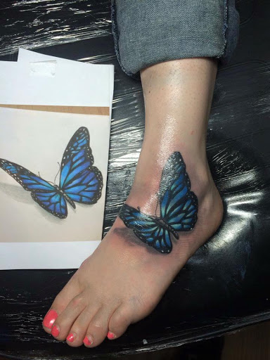 Explore tattoo ideas daisy, creative tattoo ideas in Ronkonkoma, available at Ink Buster Tattoo