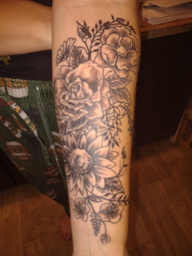 Explore tattoo ideas for a submissive, creative tattoo ideas in Elkhart, available at Liquid Ink 2 Tattoos & Body Piercings