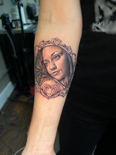 Explore tattoos for your son ideas, creative tattoo ideas in Roanoke, available at Saint Cecilias Art Studio