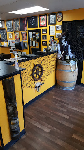 Explore lower stomach tattoo ideas, creative tattoo ideas in Stockton, available at THE PIRATES LOUNGE TATTOO PARLOR