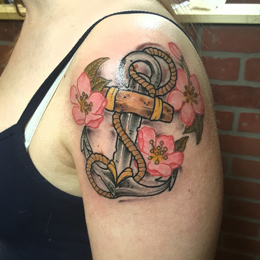 Explore arm sleeve tattoo ideas for men, creative tattoo ideas in Batavia, available at Affliction Ink