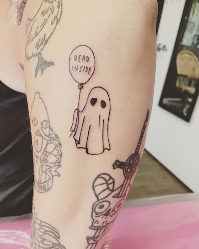 Explore morbid tattoo ideas, creative tattoo ideas in Lake City, available at Crooked Spines Tattoo Studio