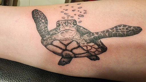 Explore 3 little birds tattoo ideas, creative tattoo ideas in Minocqua, available at Walking Arts Tattoos