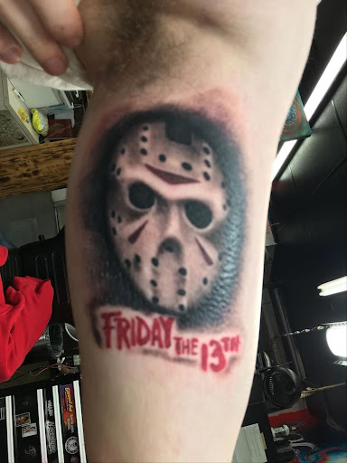 Explore tiger lily tattoo ideas, creative tattoo ideas in Houston, available at 333 Tattoo Studio HTX