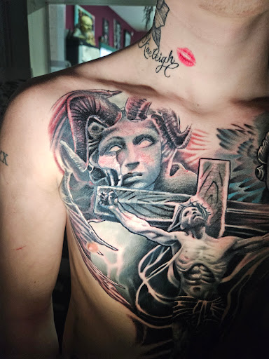 Explore tattoo leg ideas, creative tattoo ideas in Angola, available at Hoodlum Ink