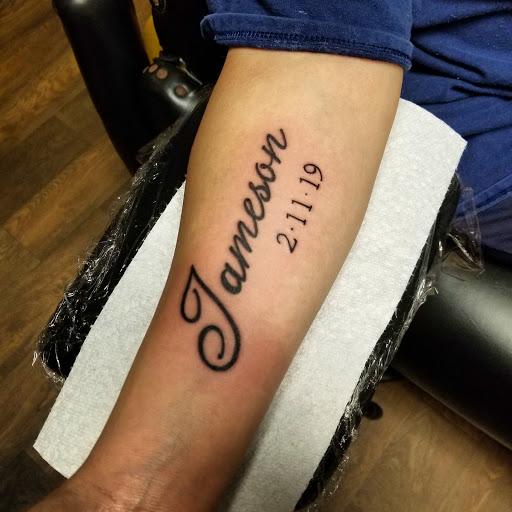 Explore foot tattoo ideas for men, creative tattoo ideas in Cumberland, available at Queen City Ink