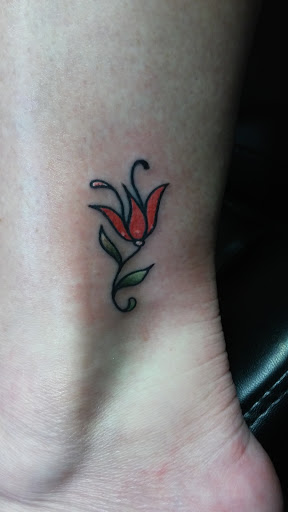 Explore arm butterfly tattoo ideas, creative tattoo ideas in Huntsville, available at FN Classy Tattoo Body Piercing