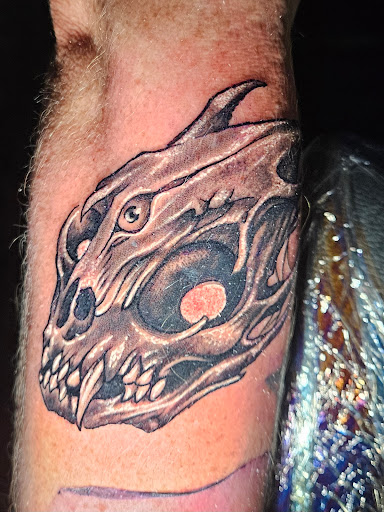 Explore brother tattoo ideas, creative tattoo ideas in Angola, available at Hoodlum Ink