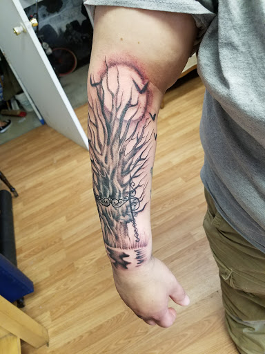 Explore chaos tattoo ideas, creative tattoo ideas in Newark, available at Cruel Hand Tattoo