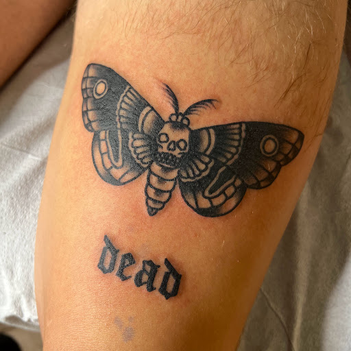 Explore small ear tattoo ideas, creative tattoo ideas in Buffalo, available at True Gloom Tattoo Studio