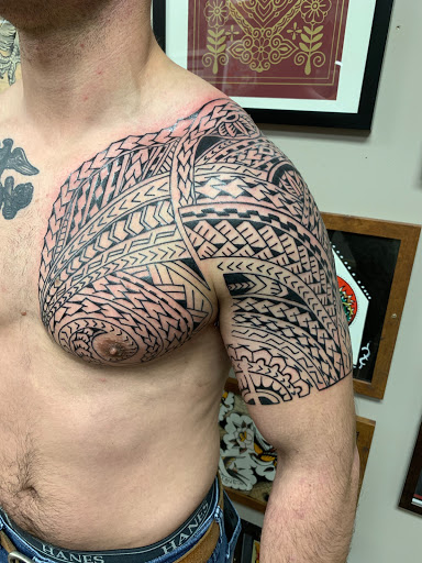 Explore spine tattoo ideas male, creative tattoo ideas in Strasburg, available at Champion Tattoo Company