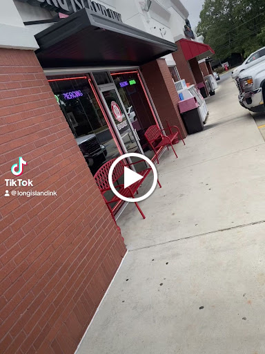 Explore man in the arena tattoo ideas, creative tattoo ideas in Douglasville, available at Long Island Ink Tattoo & Piercing