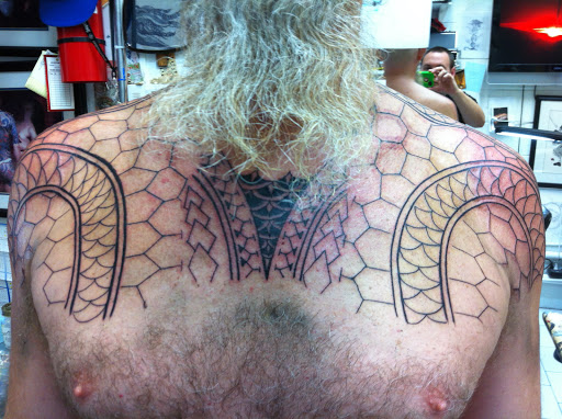 Explore shield tattoo ideas, creative tattoo ideas in Honolulu, available at 434 TATTOO WAIKIKI