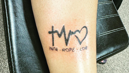 Explore rose vine tattoo ideas, creative tattoo ideas in Waldorf, available at Hypnotique Ink