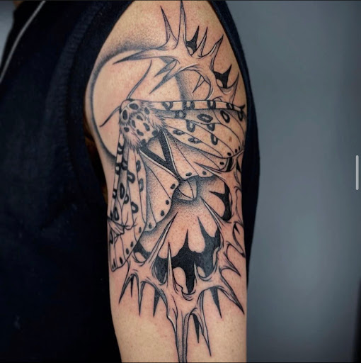 Explore slave tattoo ideas, creative tattoo ideas in Stockbridge, available at Black Rose Tattoo Collective