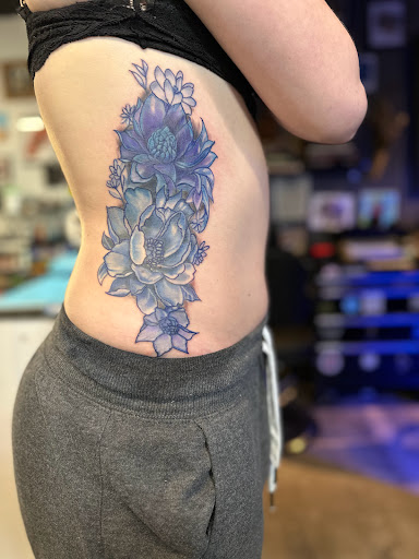 Explore ear tattoo ideas for females, creative tattoo ideas in Ronkonkoma, available at Ink Buster Tattoo