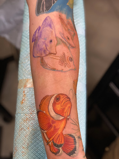 Find angel hand tattoo ideas for your next unique tattoo in Marietta at Sink or Swim Studio and Gallery
