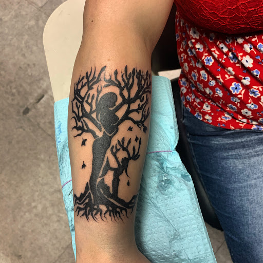 Find boob tattoo ideas for females for your next unique tattoo in Hudson Falls at ALTERED ADDICTION TATTOOS