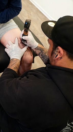 Explore female neck tattoo ideas, creative tattoo ideas in Oxnard, available at Downtown Tattoo & Body Piercing