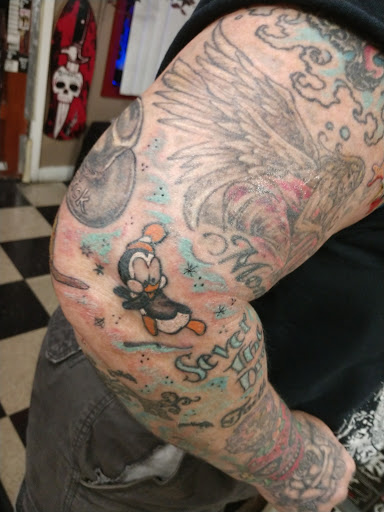 Explore wedding ring tattoo cover up ideas, creative tattoo ideas in Bondsville, available at Milltown Ink Tattoo & Piercing