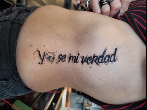 Explore spiritual 444 tattoo ideas, creative tattoo ideas in Palm Harbor, available at Angry Owl Tattoo and Piercing