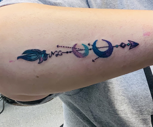 Explore girly hand tattoos ideas, creative tattoo ideas in Valley Park, available at Full Spectrum Tattoo