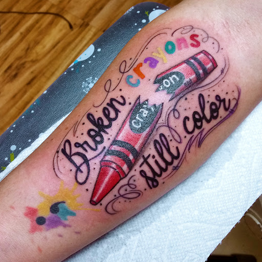 Explore fine line tattoo ideas for females, creative tattoo ideas in Owosso, available at Expressions Body Art Studio