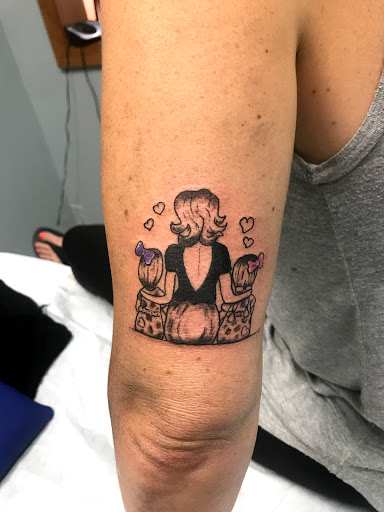 Explore spinal tattoo ideas, creative tattoo ideas in Aurora, available at Ronin Tattoo Studio INC