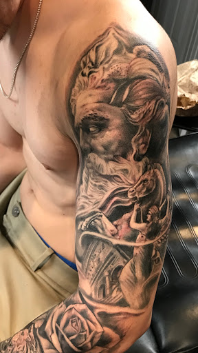 Explore coy fish tattoo ideas, creative tattoo ideas in Murrieta, available at CON INK TATTOOS LLC