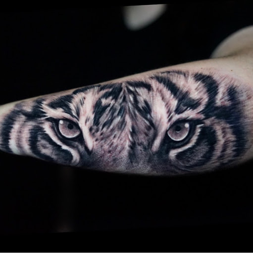 Explore word tattoo ideas for guys, creative tattoo ideas in Warrenville, available at UpRise Tattoos