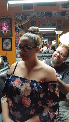 Explore tulip tattoo ideas, creative tattoo ideas in New Albany, available at ThInker Tattoos
