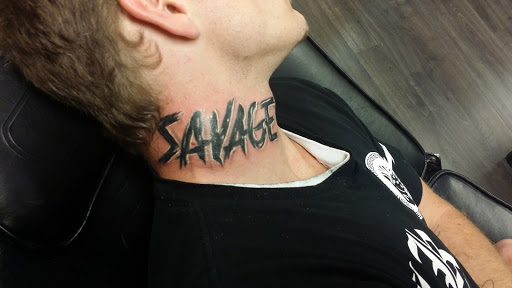 Explore five finger death punch tattoo ideas, creative tattoo ideas in Fort Wayne, available at Grade A Tattoos and Body Piercing