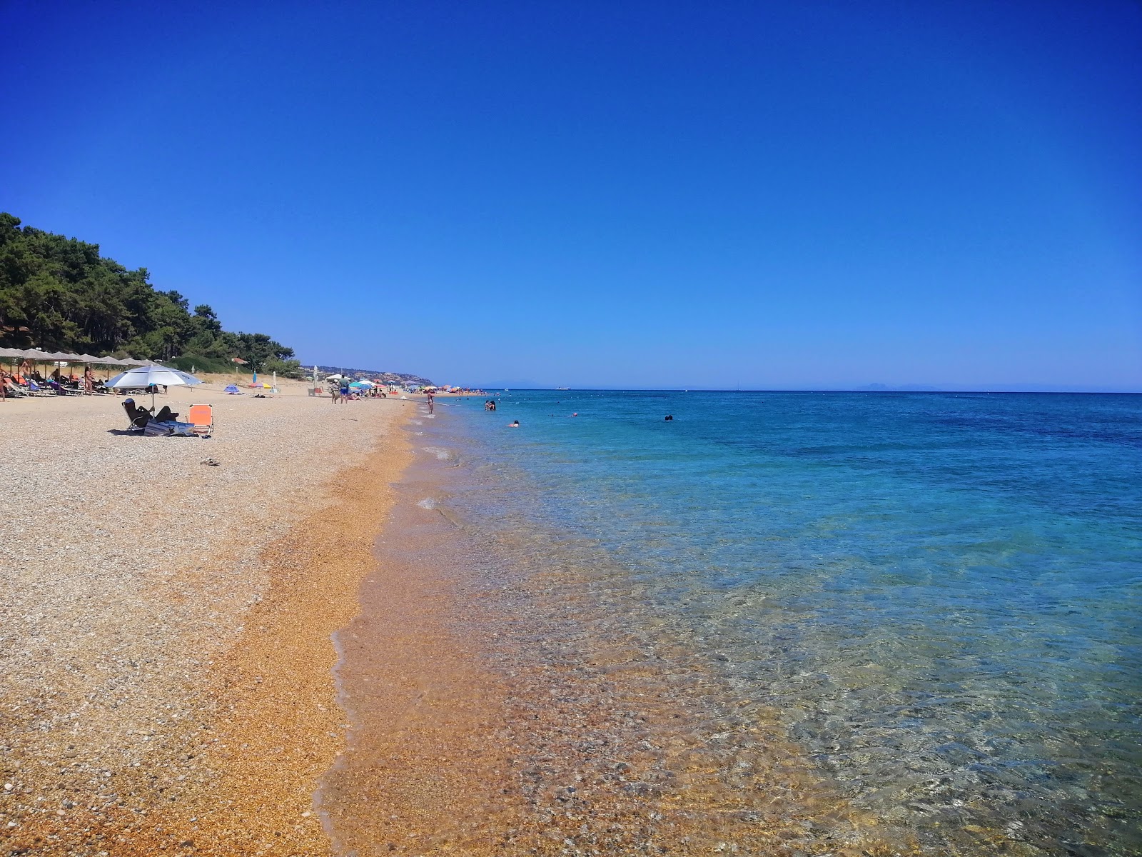Foto van Skala strand met turquoise puur water oppervlakte