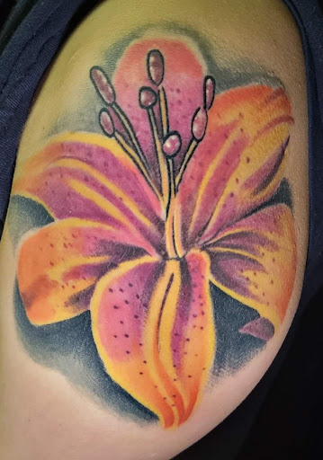 Explore tattoo mom ideas, creative tattoo ideas in Angola, available at Hoodlum Ink