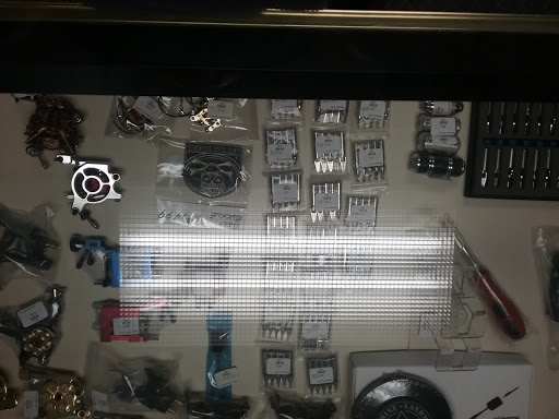 Explore small tattoo ideas for lower back, creative tattoo ideas in Akron, available at The Glass House