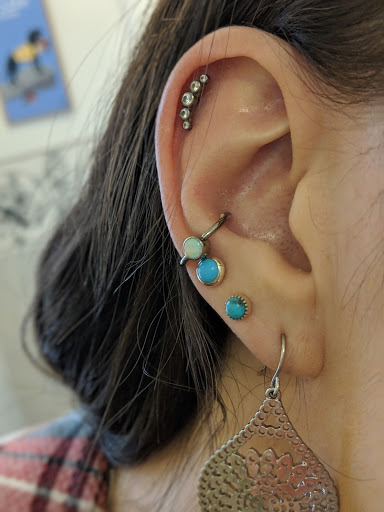 Explore pansy tattoo ideas, creative tattoo ideas in Rochester, available at Dorje Adornments