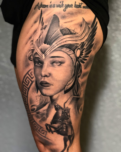 Explore butterfly leg tattoo ideas, creative tattoo ideas in Riverview, available at 9-Line Tattoo