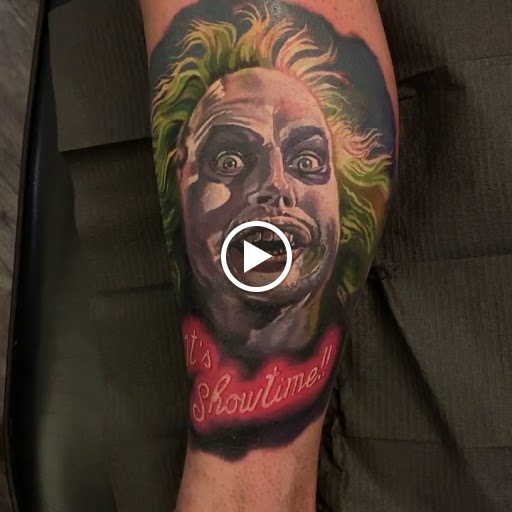 Explore fighting tattoo ideas, creative tattoo ideas in Clinton, available at Black Relic Tattoo