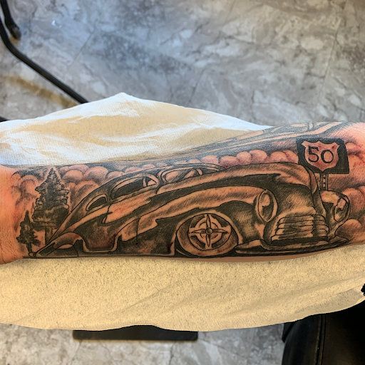 Explore roman numeral tattoo ideas for guys, creative tattoo ideas in Seymour, available at American Gypsy Tattoo Corp.