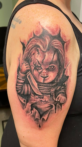 Explore optical illusion tattoo ideas, creative tattoo ideas in Girard, available at Empress Tattoos FKA Treehouse Tattoo