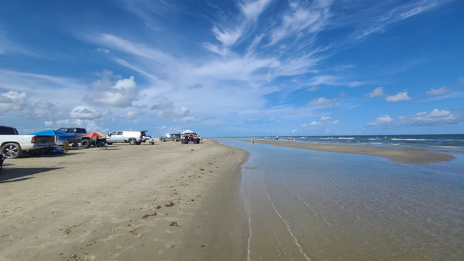 Foto de San Luis beach com areia brilhante superfície