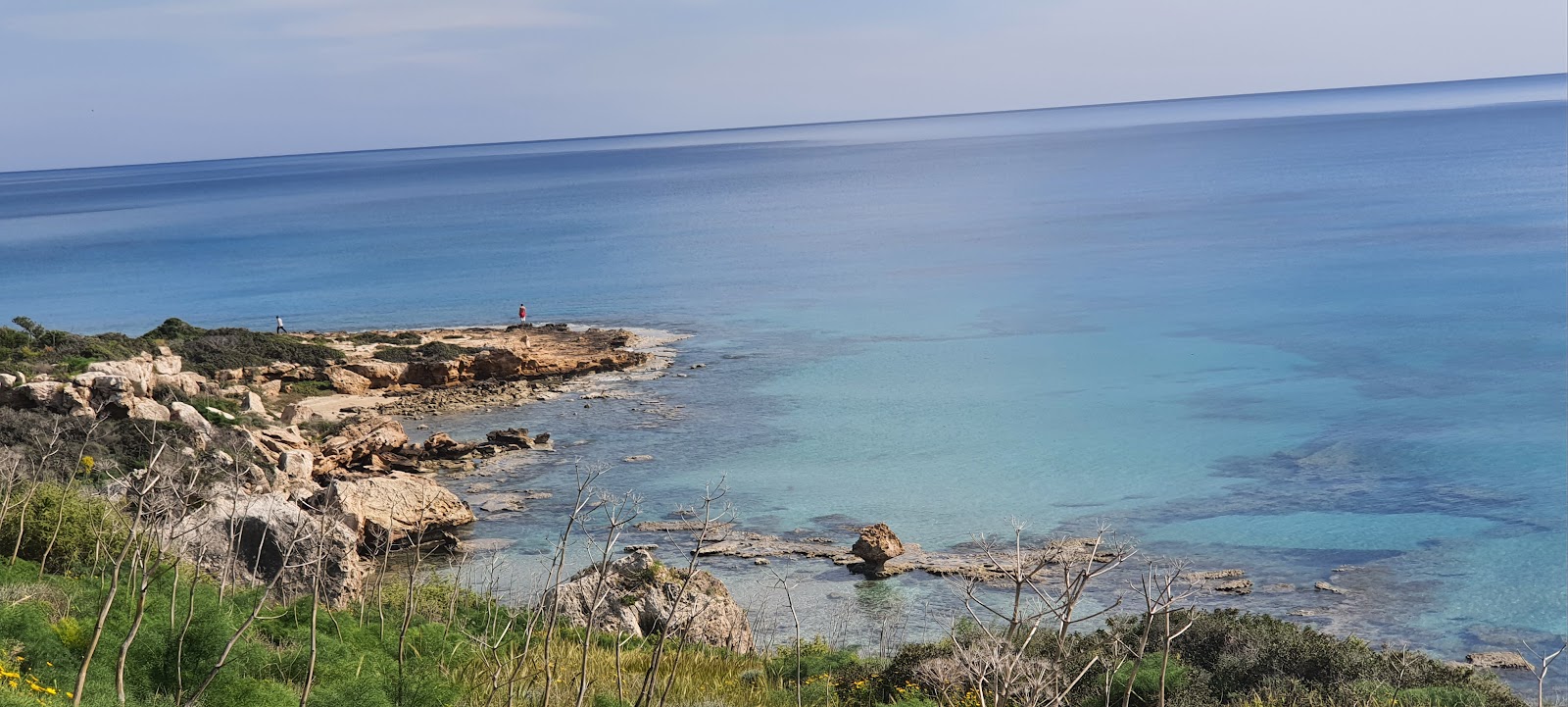 Foto de Mushroom Beach con arena beige y rocas superficie