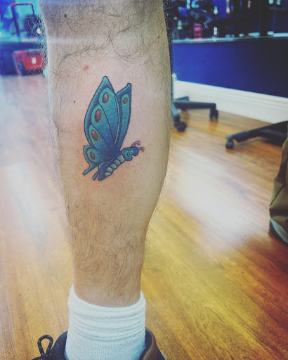 Explore graveyard tattoo ideas, creative tattoo ideas in Cocoa, available at Rorschach Tattoo Shop and Piercing Studio