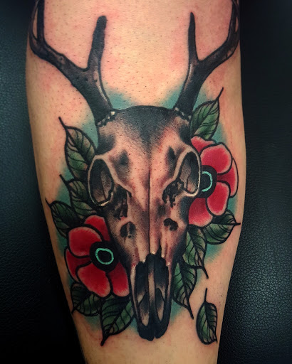 Explore cat and dog tattoo ideas, creative tattoo ideas in Snohomish, available at Unknown Tattoo Co.