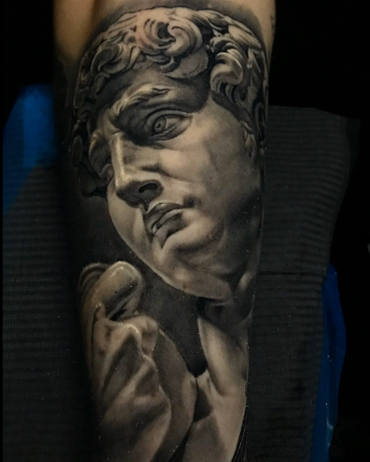 Explore michigan wolverines tattoo ideas, creative tattoo ideas in San Antonio, available at Firme Copias Tattoo Studio