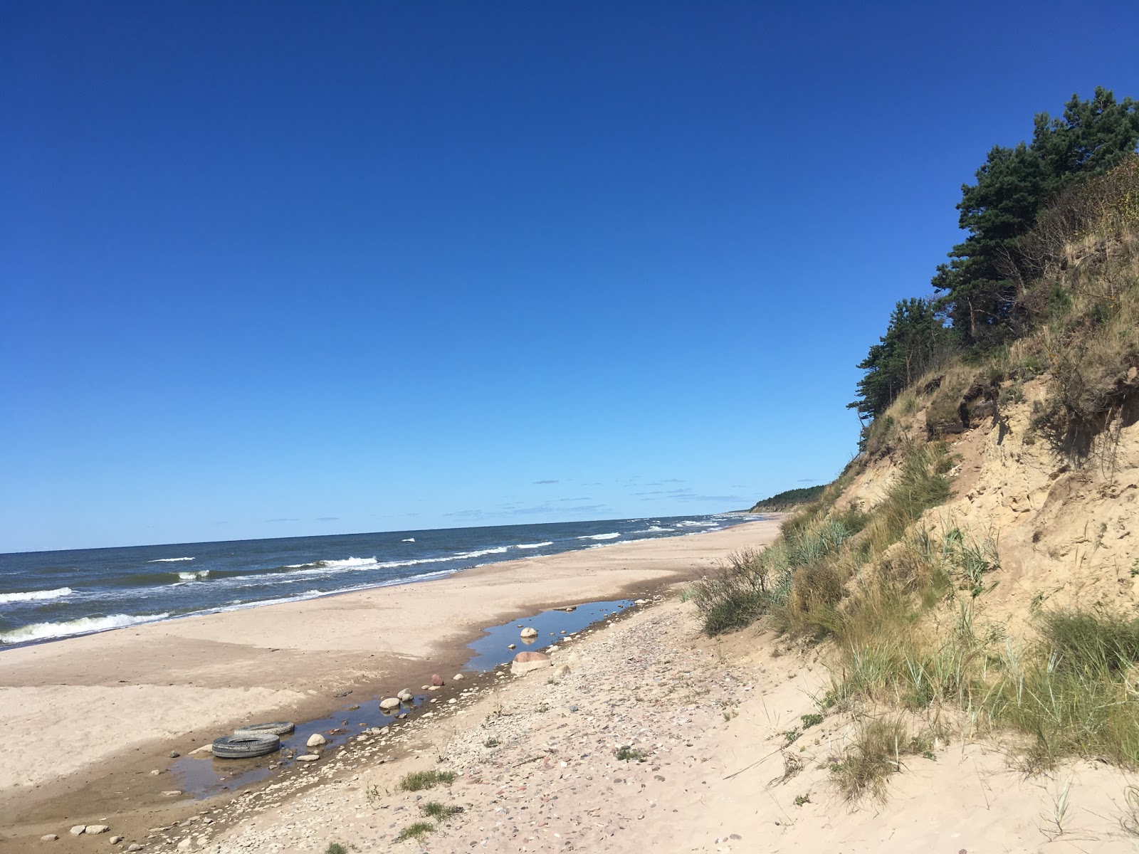 Foto di Ziemupes beach con una superficie del sabbia beige
