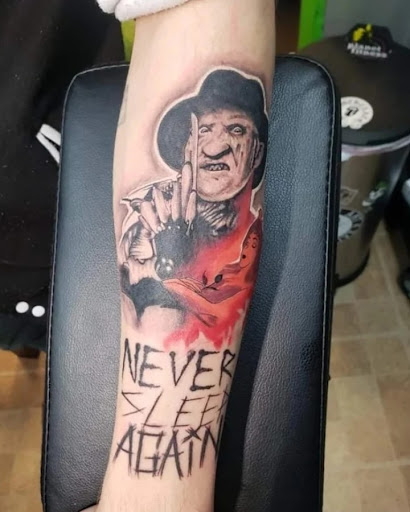 Explore simple tattoo ideas for guys, creative tattoo ideas in Decatur, available at Exclusive Ink Tattoos & Body Piercings 22nd & Wood