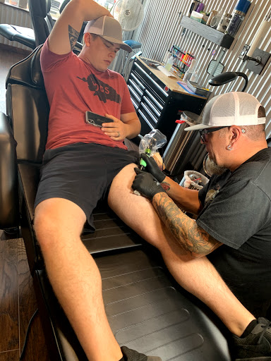 Explore family tree tattoo idea, creative tattoo ideas in Denison, available at Crossroads Tattoo Studio