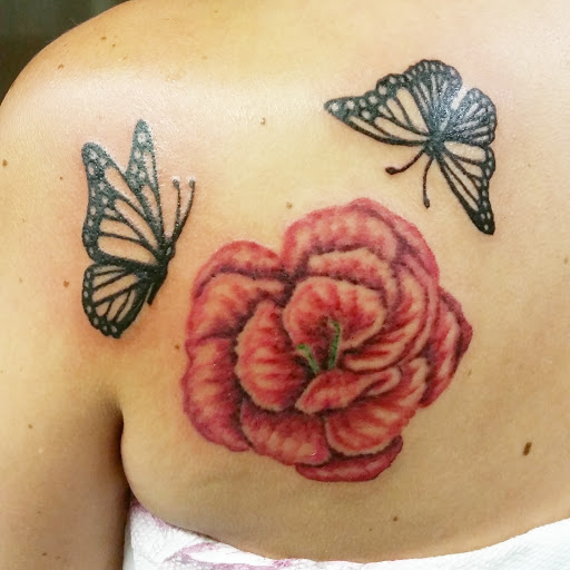 Explore american flag sleeve tattoo ideas, creative tattoo ideas in Erie, available at EliKingInk