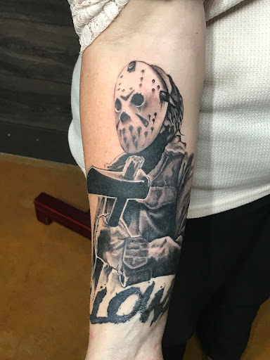 Explore tattoo of child's name ideas, creative tattoo ideas in High Point, available at 21 Aces Tattoo Co.